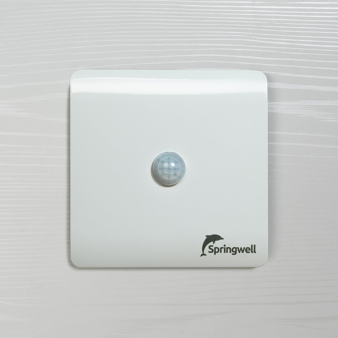 White motion sensor with Springwell logo on a light gray background